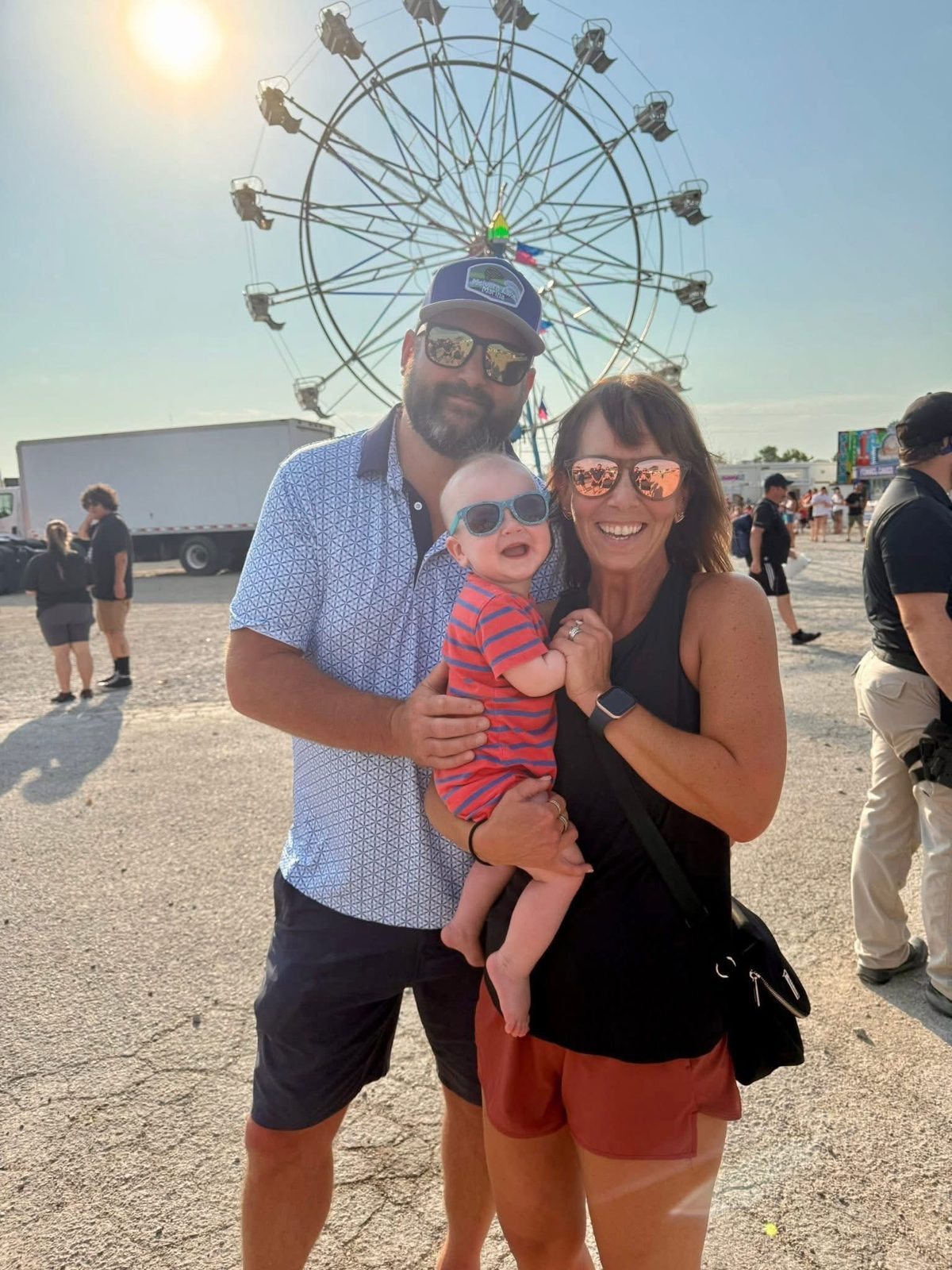Jamie and Laci with grandson Finn at the fair